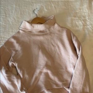 Pink turtleneck